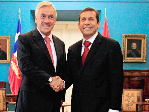 Presidente Sebastián Piñera de Chile, se saluda cordialmente con el mandatario peruano Ollanta Humala. A propósito hay que recordar que el Triangulo Terrestre es peruano pues quedó delimitado por el Tratado de 1929